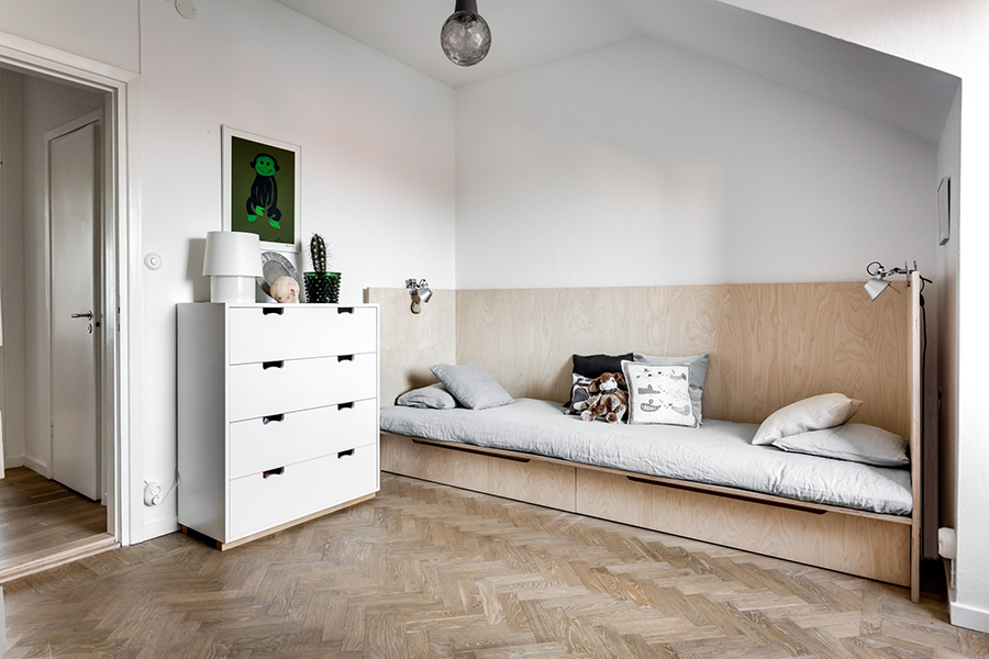 a kitchen of natural wood and steel